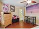 bedroom with Hello Kitty decor, dresser, and vanity area at 501 N Normandale Ave, Orlando, FL 32835