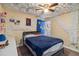 Bedroom featuring a cloud ceiling, full-size bed, and whimsical decor at 501 N Normandale Ave, Orlando, FL 32835
