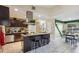 Modern kitchen with granite island, stainless steel appliances, and ample cabinet space at 501 N Normandale Ave, Orlando, FL 32835