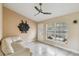 Living room with light walls and a comfortable couch at 501 N Normandale Ave, Orlando, FL 32835