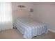 Bedroom with a full-size bed and window coverings at 9054 Rhodes St, Kissimmee, FL 34747