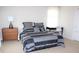 Bedroom with a queen-size bed and a built-in desk at 9054 Rhodes St, Kissimmee, FL 34747