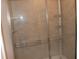 Large walk-in shower with glass enclosure at 9054 Rhodes St, Kissimmee, FL 34747