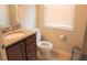 Clean bathroom with granite countertop, toilet and single sink at 9054 Rhodes St, Kissimmee, FL 34747
