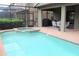 Inviting refreshing blue swimming pool with spa at 9054 Rhodes St, Kissimmee, FL 34747