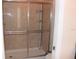 Clean bathroom with glass enclosed shower and tiled walls at 9054 Rhodes St, Kissimmee, FL 34747