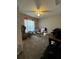 Bedroom with window, ceiling fan and ample floor space at 3882 Willow Ridge Dr, Lakeland, FL 33810