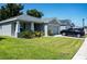 Gray house with a two-car garage and a black SUV parked at 3882 Willow Ridge Dr, Lakeland, FL 33810