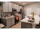 Modern kitchen with stainless steel appliances and an island at 3882 Willow Ridge Dr, Lakeland, FL 33810