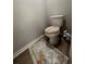 Small bathroom with toilet and flooring at 3882 Willow Ridge Dr, Lakeland, FL 33810