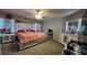 Spacious bedroom with a king-size bed and en-suite bathroom at 3882 Willow Ridge Dr, Lakeland, FL 33810