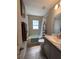 Clean bathroom with bathtub, shower, and modern vanity at 3882 Willow Ridge Dr, Lakeland, FL 33810