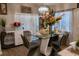 Bright dining room featuring a glass table and modern chairs at 3882 Willow Ridge Dr, Lakeland, FL 33810