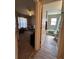 Hallway view showing access to bedroom and bathroom at 3882 Willow Ridge Dr, Lakeland, FL 33810