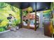 bedroom with bunk beds and jungle theme at 1692 Tropical Palms Cir, Kissimmee, FL 34747