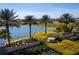 Solara Resort entrance with palm trees and water feature at 1692 Tropical Palms Cir, Kissimmee, FL 34747