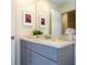 Clean bathroom with vanity, sink, and modern gray cabinets at 1692 Tropical Palms Cir, Kissimmee, FL 34747