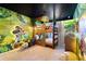 bedroom with bunk beds and jungle theme at 1692 Tropical Palms Cir, Kissimmee, FL 34747