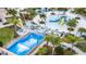 Aerial view of resort-style pool and surf simulator at 1692 Tropical Palms Cir, Kissimmee, FL 34747