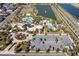 Aerial view of community amenities, including pools and parking at 1692 Tropical Palms Cir, Kissimmee, FL 34747