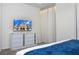Bright bedroom with a large TV and comfortable bedding at 1692 Tropical Palms Cir, Kissimmee, FL 34747