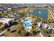 Resort-style community with pool, playground, and lake at 1692 Tropical Palms Cir, Kissimmee, FL 34747