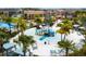 Community waterpark with slides and playground at 1692 Tropical Palms Cir, Kissimmee, FL 34747