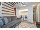 Convenient laundry room with washer, dryer, and storage shelves at 1692 Tropical Palms Cir, Kissimmee, FL 34747