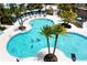 Large, Mickey Mouse-shaped pool with palm trees at 1692 Tropical Palms Cir, Kissimmee, FL 34747