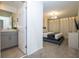Spacious bedroom with ensuite bathroom and modern features at 1692 Tropical Palms Cir, Kissimmee, FL 34747