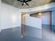 Open living space featuring modern design and glossy floors at 155 S Court Ave # 1610, Orlando, FL 32801