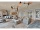Relaxing outdoor patio with fireplace and seating at 9400 Laws Rd, Clermont, FL 34714