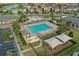 Community pool with a playground, lounge chairs, and ample parking at 10747 Belfry Cir, Orlando, FL 32832
