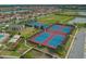 Aerial view of community tennis courts and recreational areas at 10747 Belfry Cir, Orlando, FL 32832