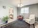 Open concept living room and kitchen with cozy seating at 36 Mayfield Cir, Ormond Beach, FL 32174