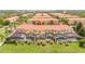 Aerial view showing multiple townhouses and community at 3004 White Orchid Rd, Kissimmee, FL 34747