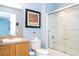 Clean bathroom with shower/tub combo and wood vanity at 3004 White Orchid Rd, Kissimmee, FL 34747