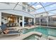 Private backyard oasis with pool and lounge chairs at 1585 Mulligan Blvd, Davenport, FL 33896