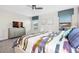 Bright bedroom with a comfy bed and TV at 1585 Mulligan Blvd, Davenport, FL 33896