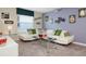 Home theater with large screen and comfortable seating at 1585 Mulligan Blvd, Davenport, FL 33896
