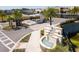 Community entrance with gatehouse, fountain, and landscaping at 7487 Brooklyn Dr, Kissimmee, FL 34747