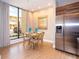 Modern kitchen with stainless steel appliances and breakfast nook at 7487 Brooklyn Dr, Kissimmee, FL 34747