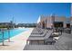 Long pool with plenty of lounge chairs at 7487 Brooklyn Dr, Kissimmee, FL 34747