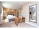 Bright bedroom with a comfortable bed and a built-in workspace at 7487 Brooklyn Dr, Kissimmee, FL 34747