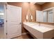 Simple bathroom with floating vanity and toilet at 7487 Brooklyn Dr, Kissimmee, FL 34747