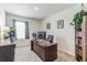 Home office with desk, chair, and built-in shelving at 1839 Wild Rye Way, Kissimmee, FL 34744