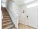 Modern staircase with neutral carpeting and white trim at 1839 Wild Rye Way, Kissimmee, FL 34744