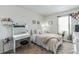 Charming bedroom with a vanity and a full-size bed at 1839 Wild Rye Way, Kissimmee, FL 34744
