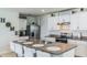 Kitchen with white cabinets, granite countertops, and island at 1839 Wild Rye Way, Kissimmee, FL 34744