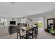 Spacious living room with comfortable seating and access to the backyard at 1839 Wild Rye Way, Kissimmee, FL 34744